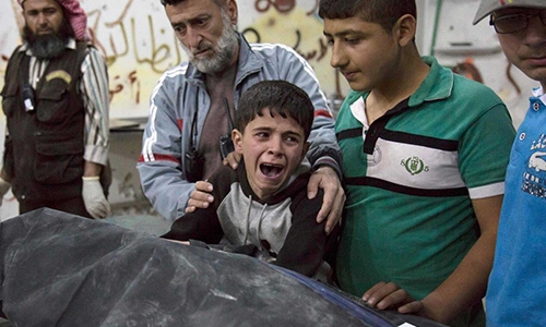 ‘I wish it was me:’ Syrian boy weeps over brother’s body