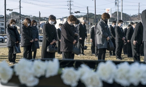 Japan marks 10th disaster anniversary while still recovering
