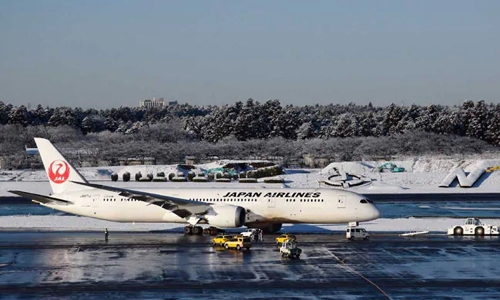 Plane skids off runway, closing parts of Narita