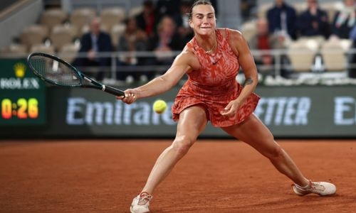 Sabalenka eases at rainswept French Open