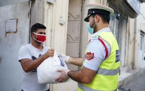 Muharraq police distribute 10,000 food baskets