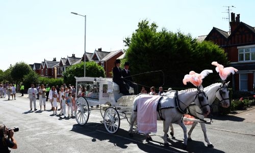 Funeral held for nine-year-old victim of UK stabbing that sparked riots