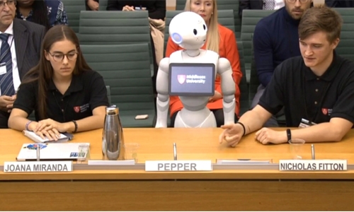 Robot in UK parliament invites ‘Maybot’ mockery