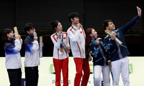 China takes first Olympic gold