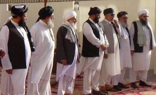 Afghan Taliban names new political head in peace talks boost