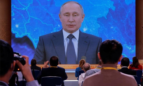 Putin says he will receive COVID-19 vaccine when he can, urges mass vaccination