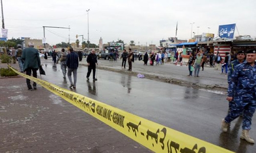 At least 9 dead in IS-claimed blasts at Baghdad mosque: police