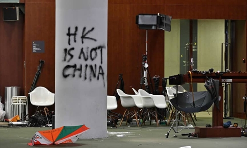 First charges against Hong Kong protester