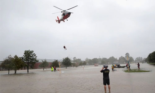 Houston races to rescue flood victims before storm's return