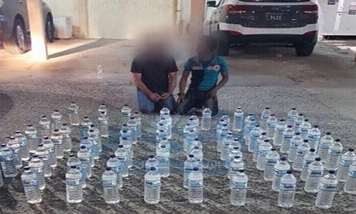 Expats arrested for running alcohol business