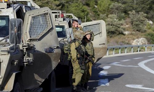 Palestinian fires at Israel troops, is shot dead: army
