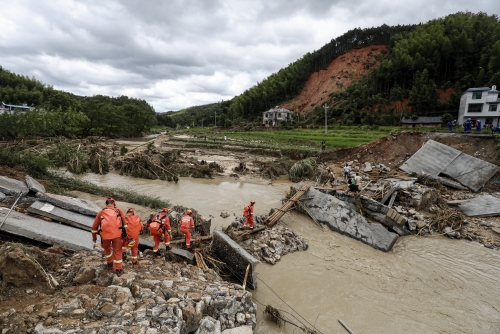 At least 30 dead, 35 missing after torrential rains: China state media