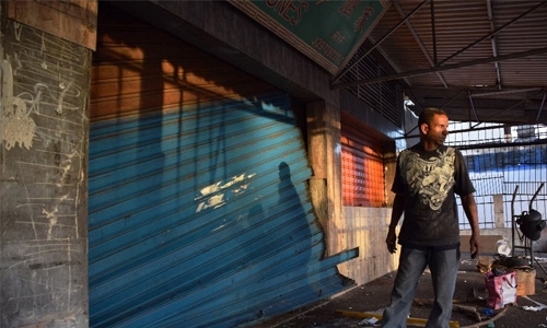 Shops shut after deadly looting in Venezuela crisis