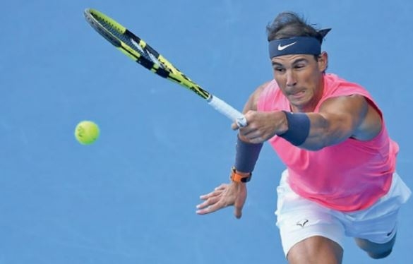 Nadal rides out Kyrgios test to reach quarters