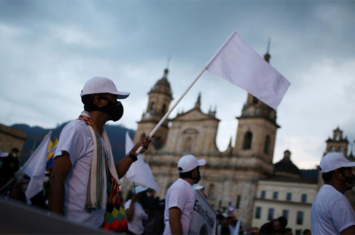 Former FARC guerrillas march in Colombia to demand end to killings