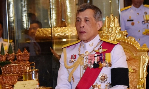 Thai king signs decree approving first election since coup