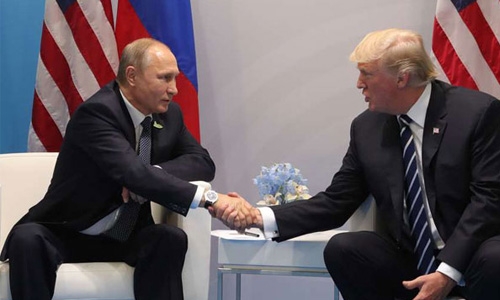 Russian media cheer over Trump and Putin handshake