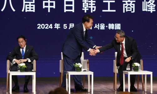South Korea, China, Japan vow to ramp up cooperation in rare summit