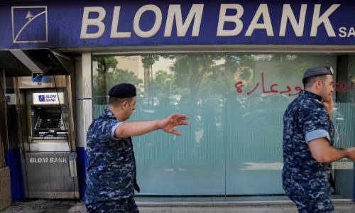 Lebanese lawmaker enters bank branch unarmed to demand frozen savings