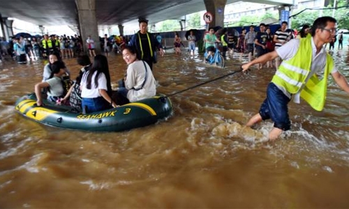 Heavy flooding in China leaves dozens dead or missing