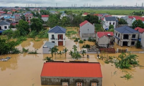 Hanoi river level hits 20-year high as SE Asia typhoon toll passes 150