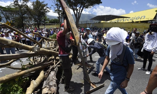 Protesters march against Venezuela's Maduro