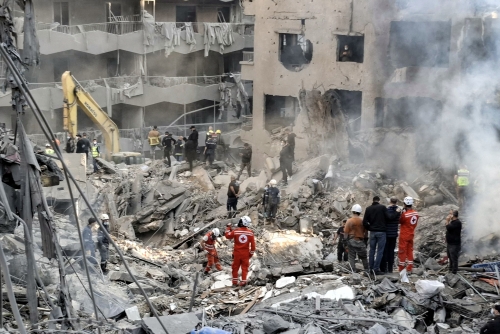 Israeli air strike kills 15 in Beirut City residents left in shock after residential building reduced to rubble