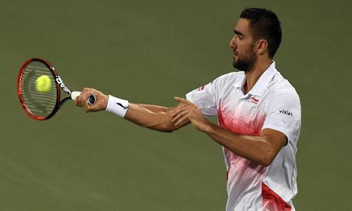 Top seed Cilic battles into Moscow quarter-finals