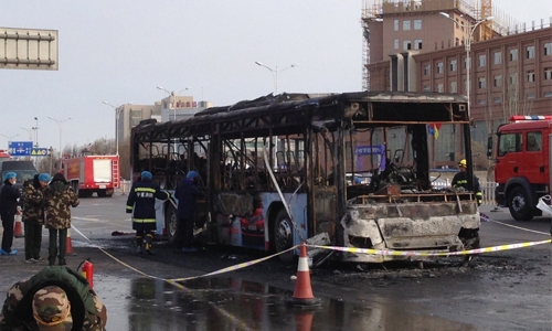 Suspect held after China bus fire kills 17