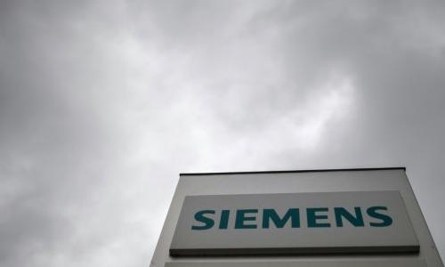 Siemens chief warns on investment after Paris attacks