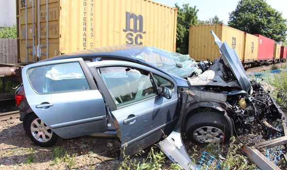 Miraculous escape for toddler after train hits her father’s car 
