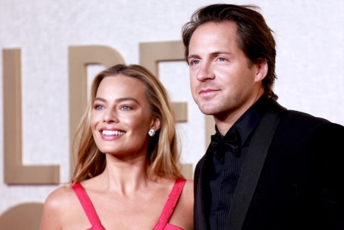 Margot Robbie ‘enjoys the challenge of motherhood’