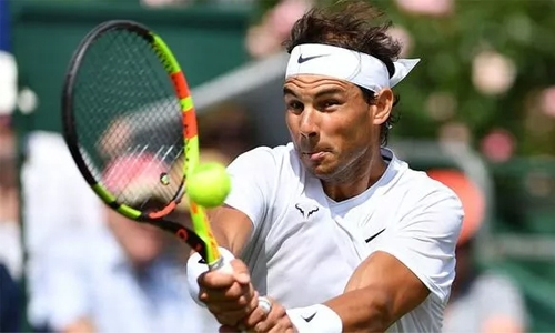 Relieved Nadal drawn to meet Federer in Wimbledon semi finals