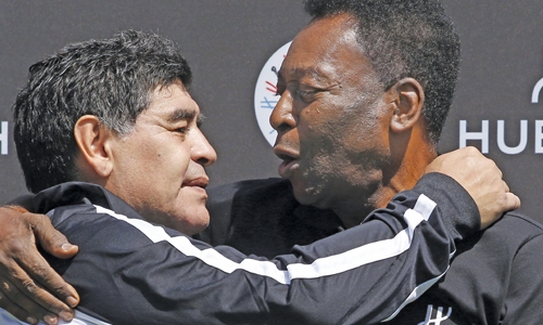 Old rivals Pele, Maradona seek ‘peace’