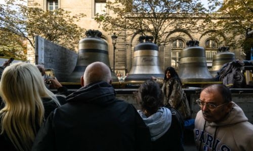 Eight bells return to belfry of Notre Dame in Paris