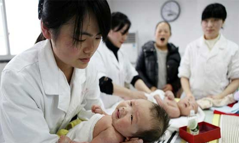 China may scrap limit on children