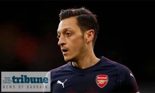 China says Arsenal’s Ozil ‘deceived by fake news’