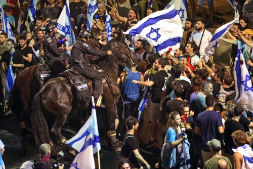 Israel PM defends 'necessary' judicial reform vote as protests flare