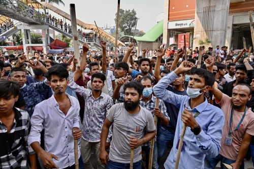 Bangladesh garment workers block roads in fair wage protest