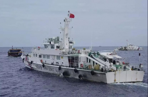 China warns Philippines not to ‘stir up trouble’ over disputed reef