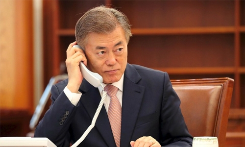 New S.Korean president talks to China, Japan leaders