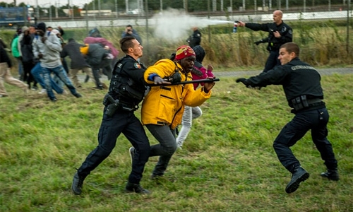 Police 'routinely' use pepper spray on migrants in Calais