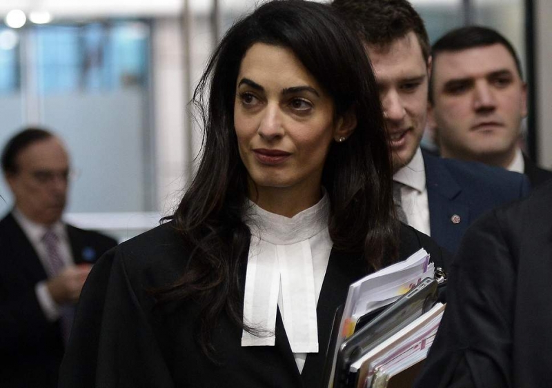 Amal Clooney appeals for reporters’ release
