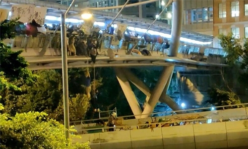 Anxious families wait outside besieged HK campus