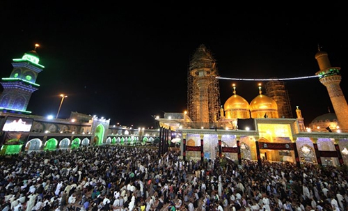 Tens of thousands flock to Baghdad shrine braving bomb threat