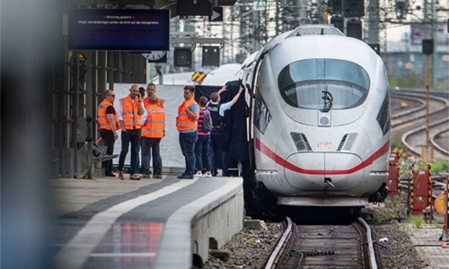 Boy, 8, dies after being pushed in front of German train