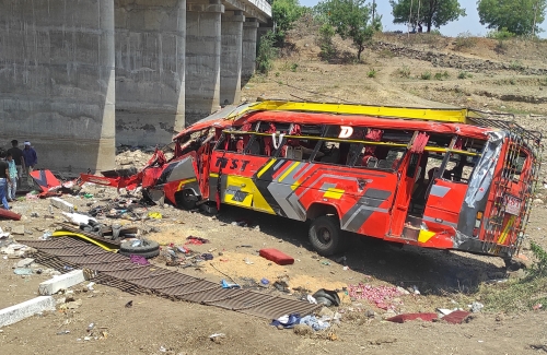 21 dead after bus plunges off bridge in India