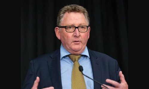 New Zealand cuts interest rate to record low