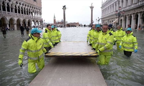 Venice comes up for air after week of record flooding