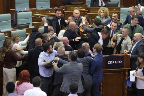 MPs brawl in Kosovo parliament amid pressure over unrest